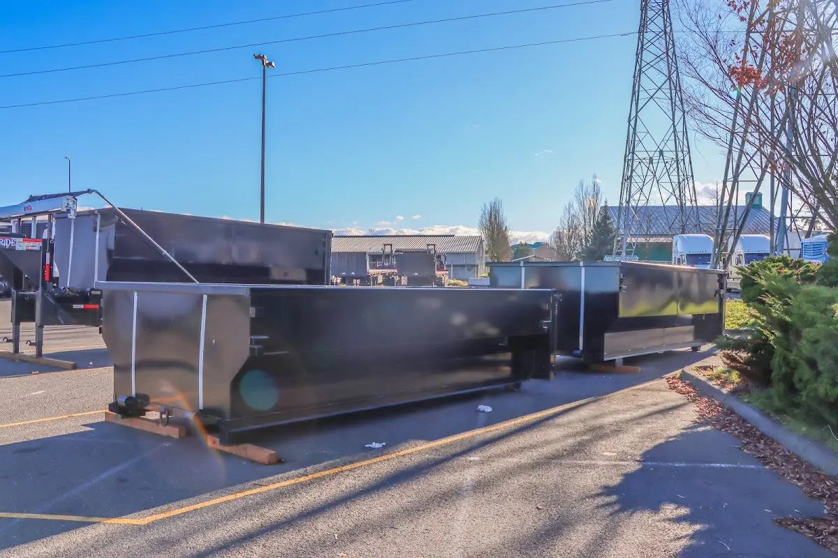 Roll-off dumpster ready for waste disposal at job site for 2 Yard Dumpster Rental in Eliot